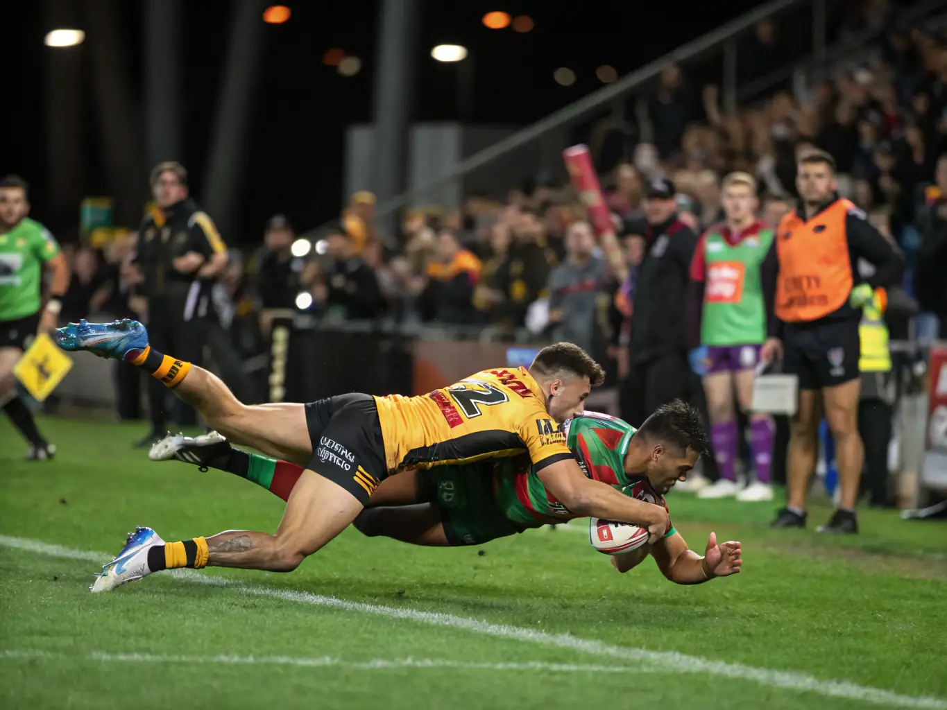 A photograph of adult rugby players in action during a match, demonstrating the intensity and camaraderie of the sport.